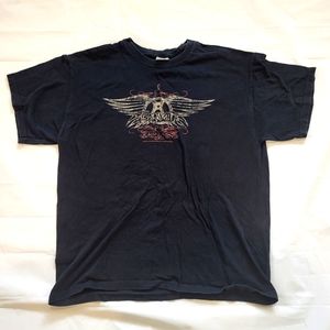 Aerosmith band t-shirt.